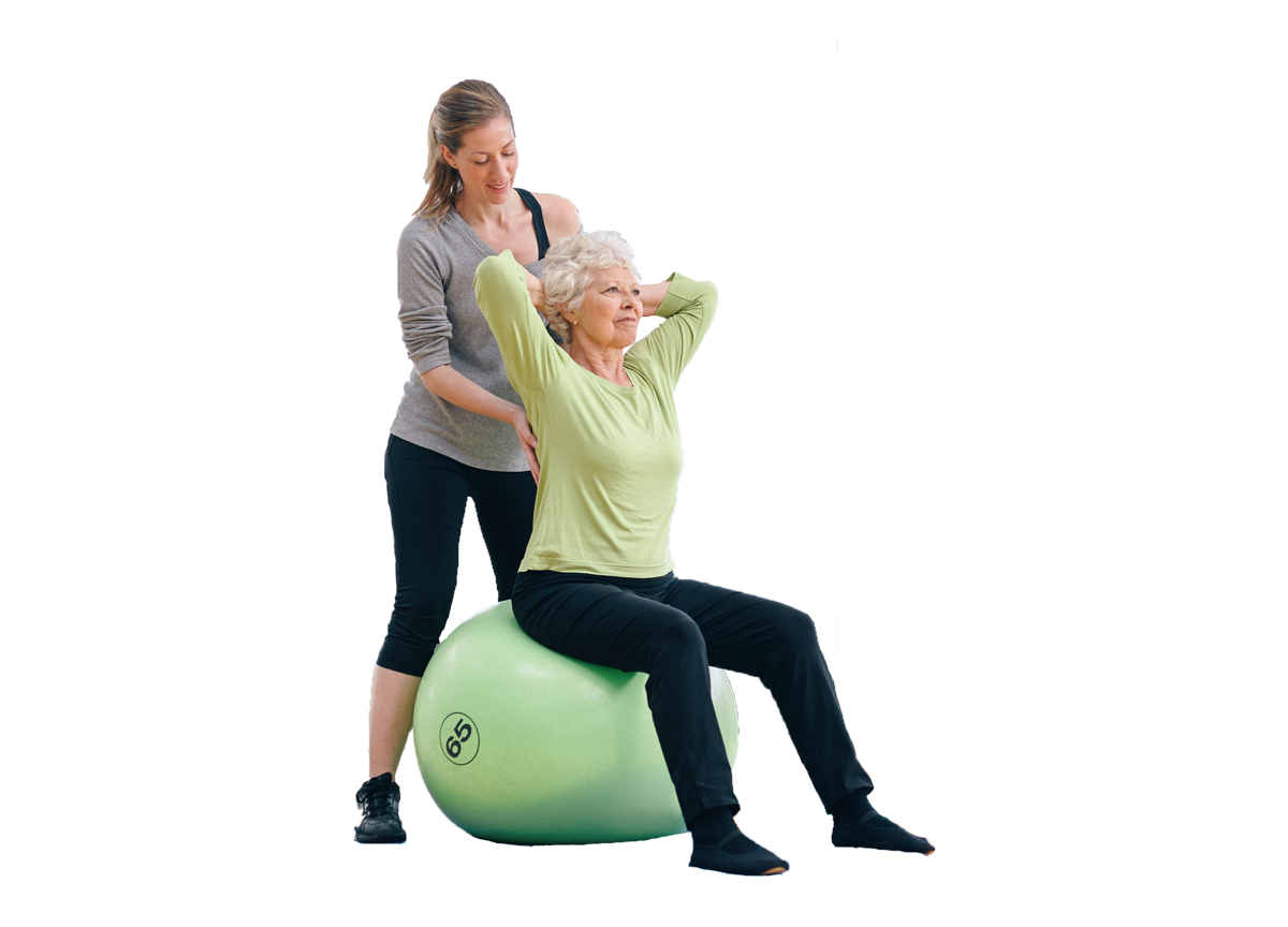 A woman on an exercise ball for vestibular rehabilitation.