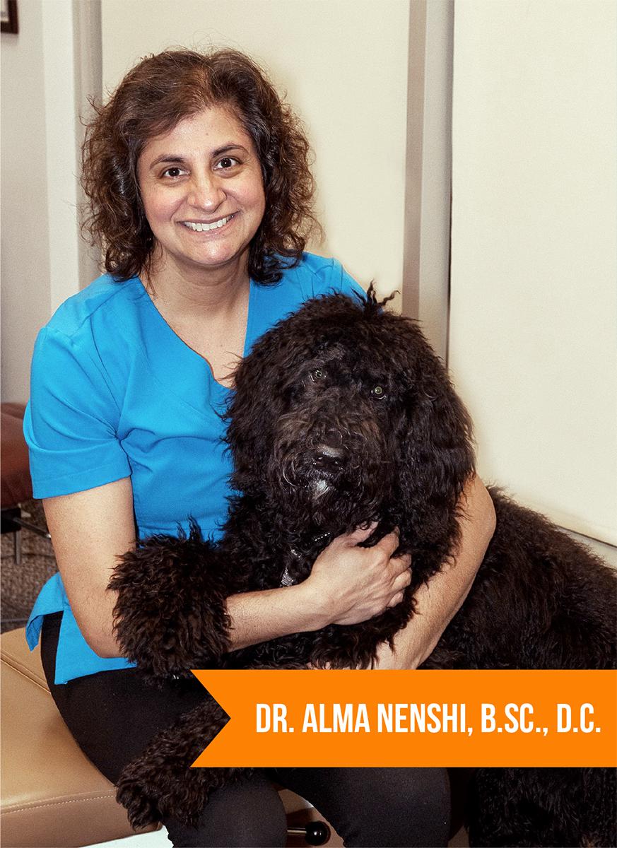 Dr. Alma Nenshi with her dog Shadow.